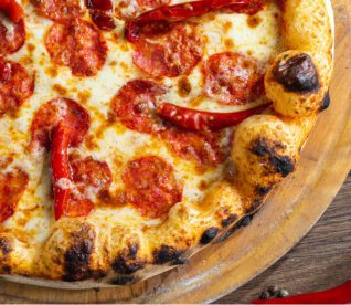 Close up of Kelowna pizza for Bless'd Sips & Slices